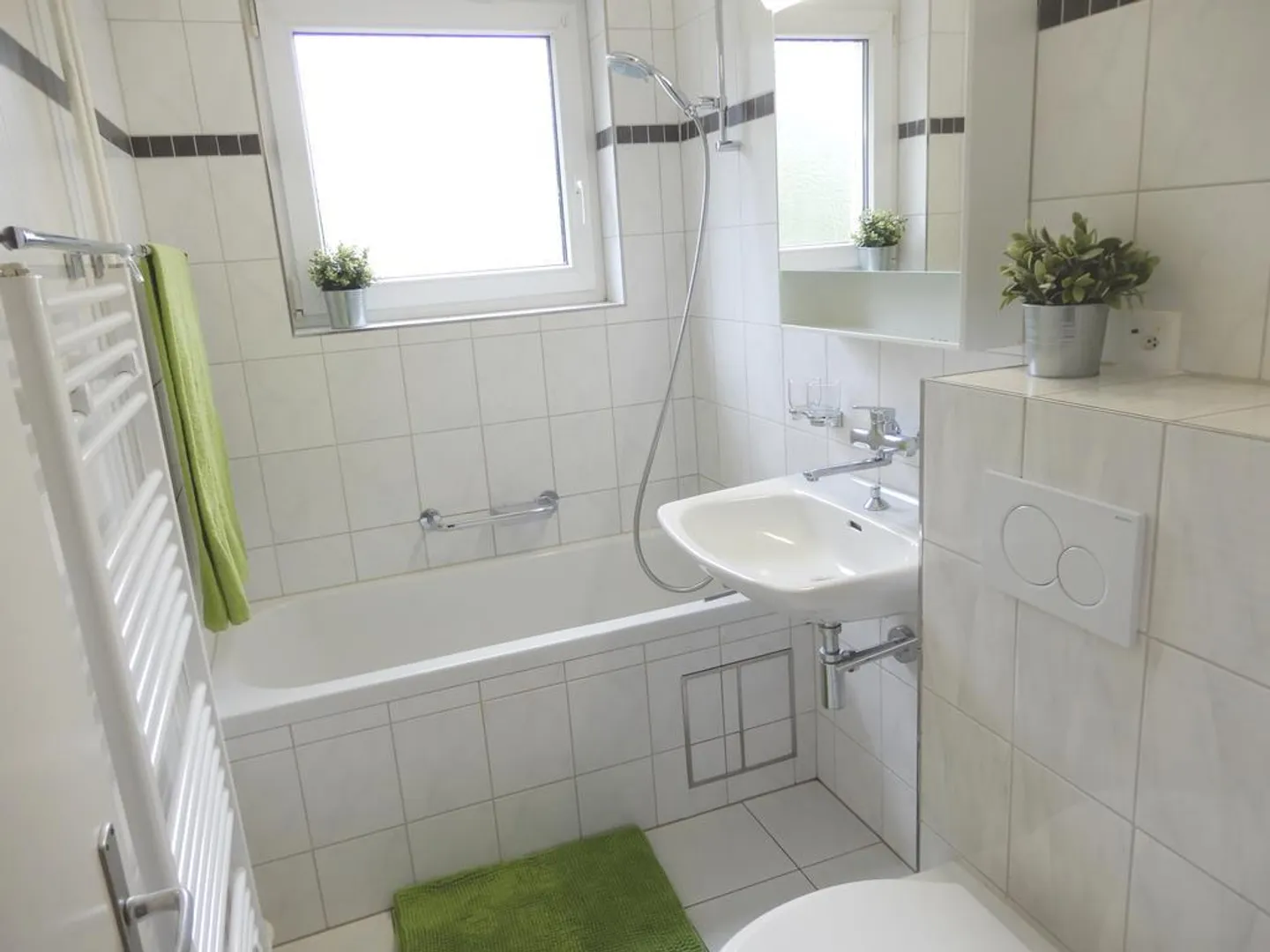 APPARTEMENT COSY AU REZ-DE-CHAUSSÉE - Photo 2 sur 8