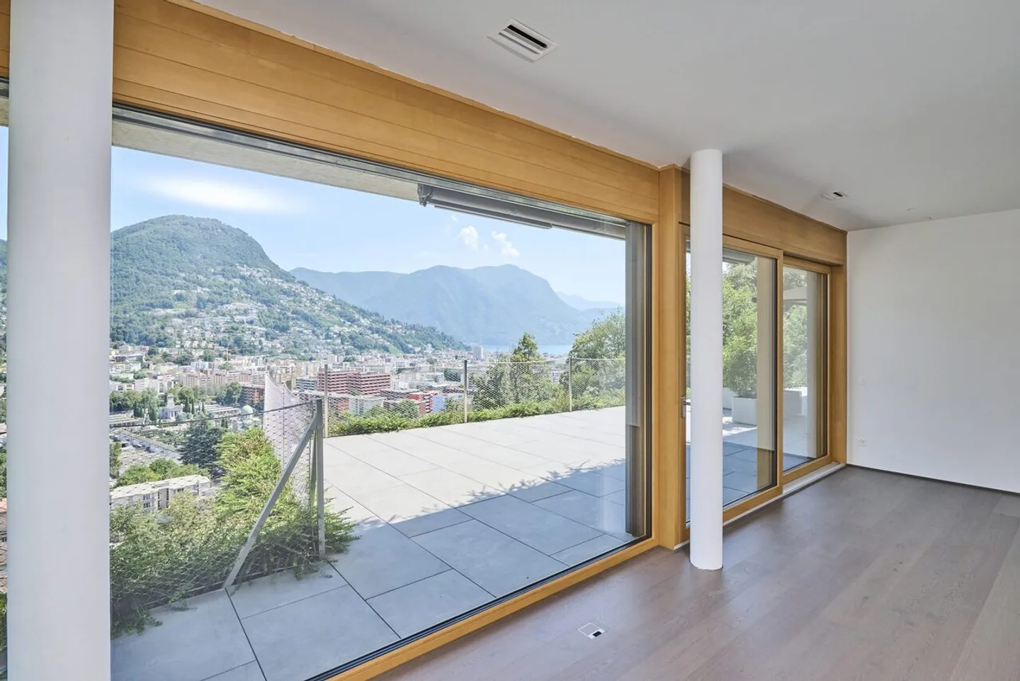 Penthouse à vendre à Lugano avec terrasse, jardin et vue sur le lac - Photo 3 sur 15
