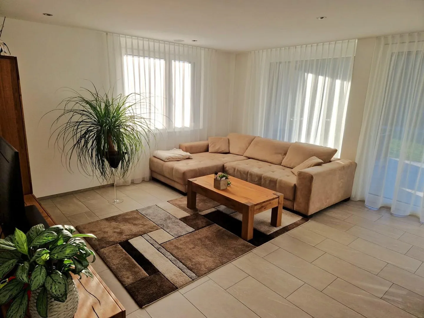 Modern, high-quality Minergie garden apartment with large terrace - Photo 3 of 10