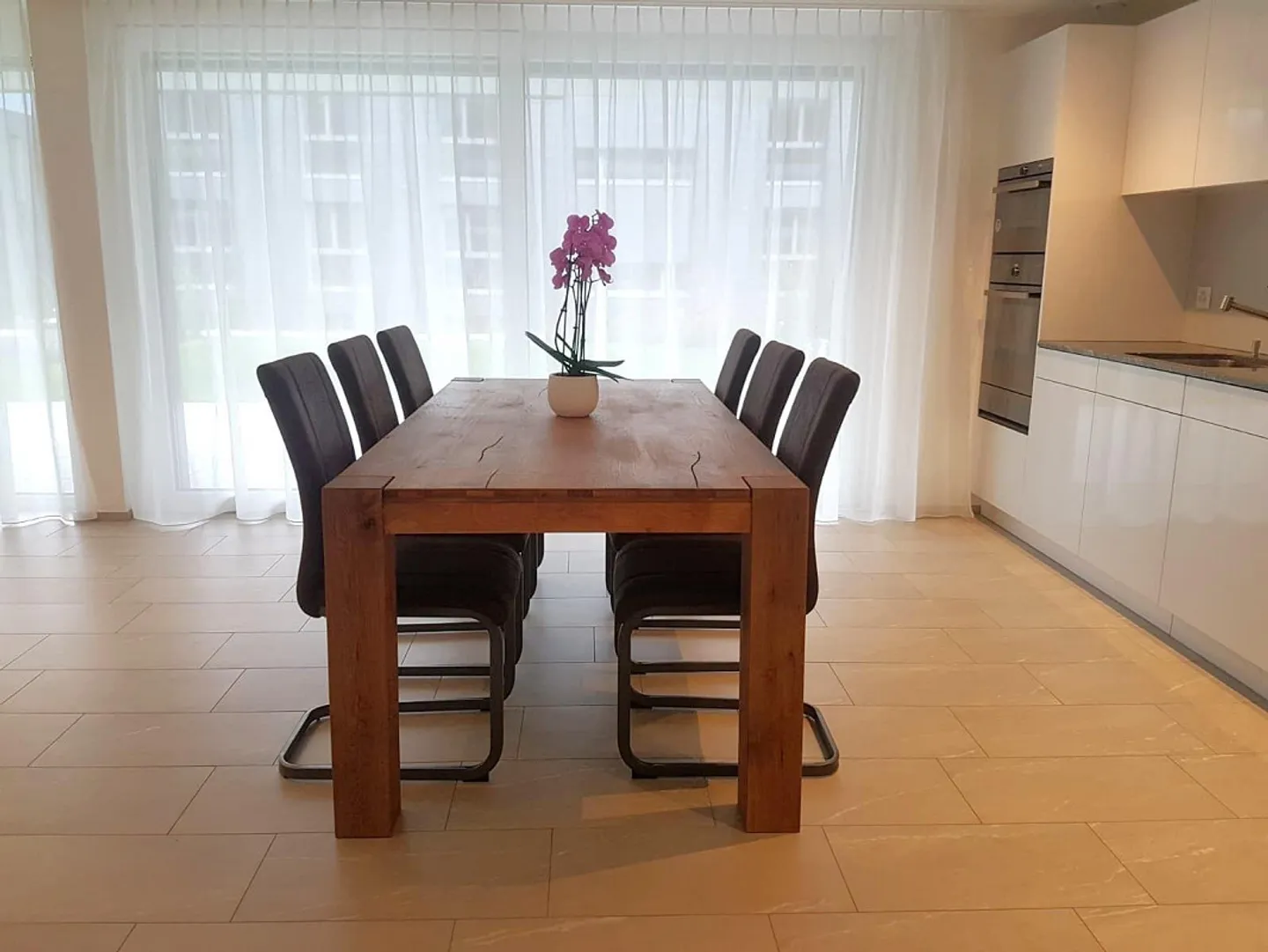 Modern, high-quality Minergie garden apartment with large terrace - Photo 4 of 10
