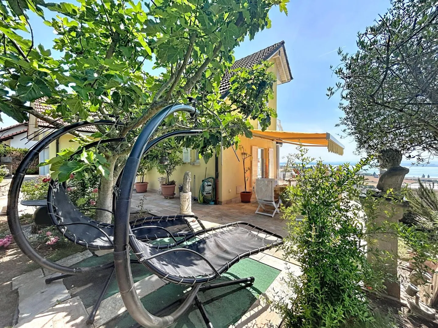 A Green Jewel with Panoramic Views of the Lake and the Alps - Photo 4 of 13
