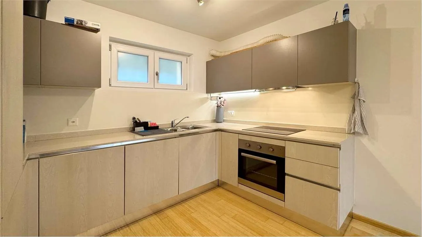 Appartamento in vendita da 2.5 locali con giardino privato - Foto 4 di 8