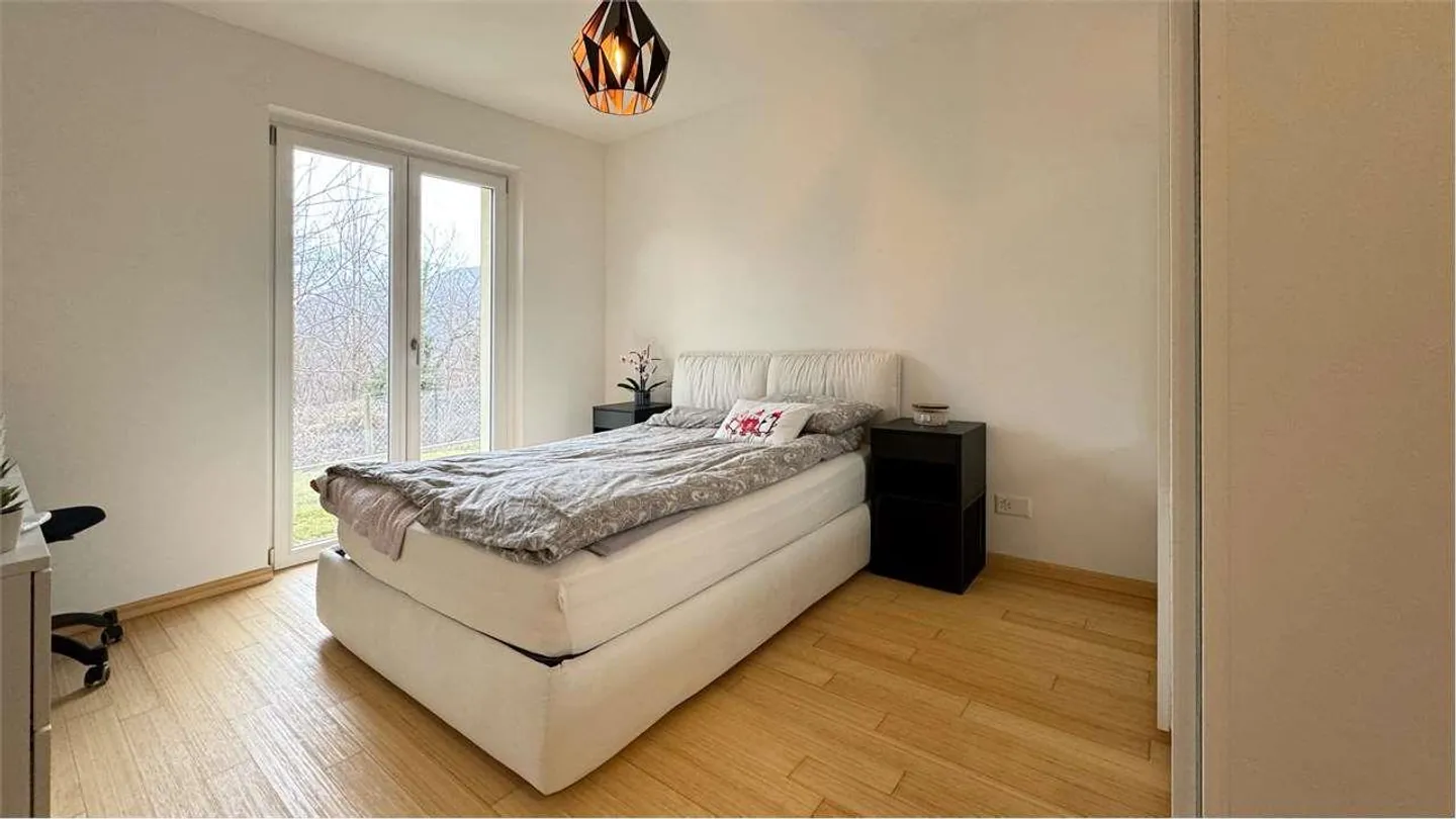 Appartamento in vendita da 2.5 locali con giardino privato - Foto 6 di 8