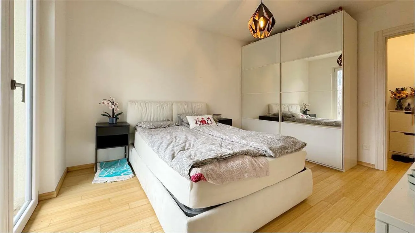 Appartamento in vendita da 2.5 locali con giardino privato - Foto 7 di 8
