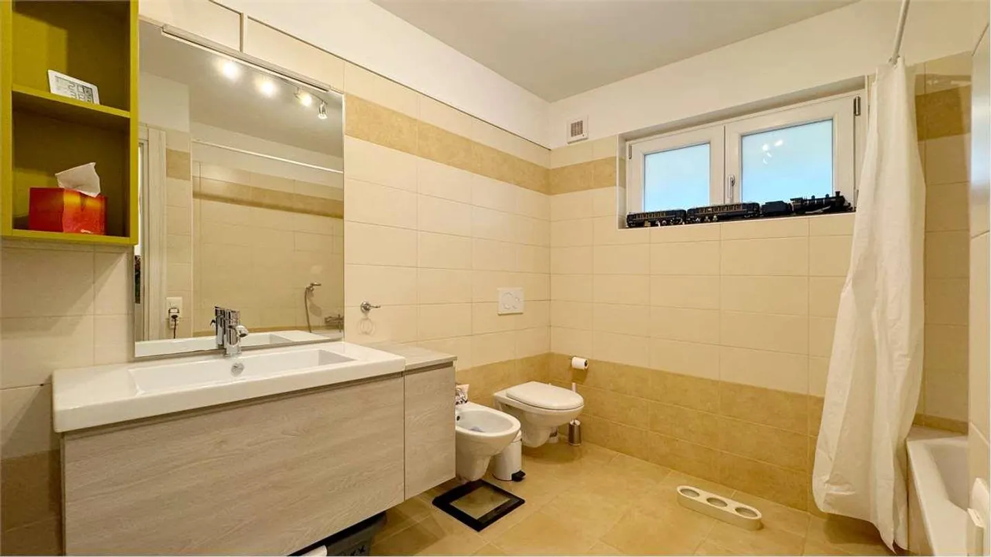 Appartamento in vendita da 2.5 locali con giardino privato - Foto 8 di 8