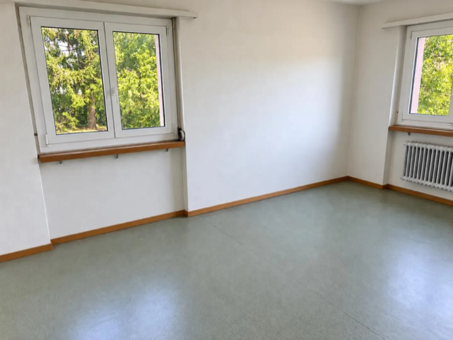 Appartement spacieux et lumineux de 2,5 pièces au rez-de-chaussée avec un coin salon... - Photo 4 sur 5