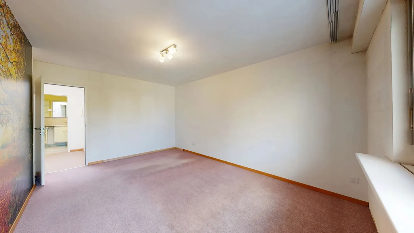 Gemütliche 2.5-Zimmer-Triplexwohnung mit Garage und Aussenparkplatz - Foto 9 von 19