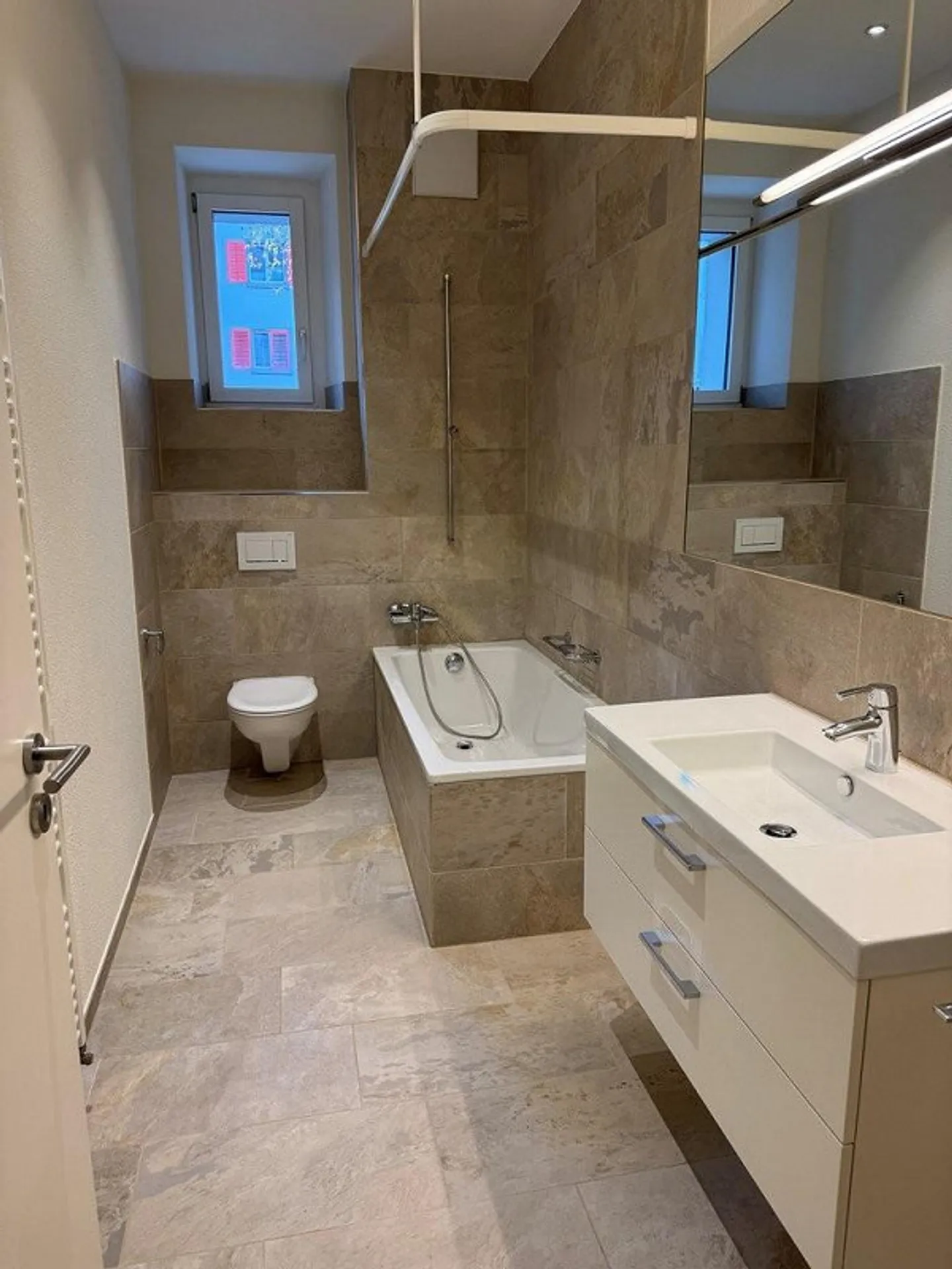 Appartement rénové dans un quartier urbain - Photo 5 sur 7