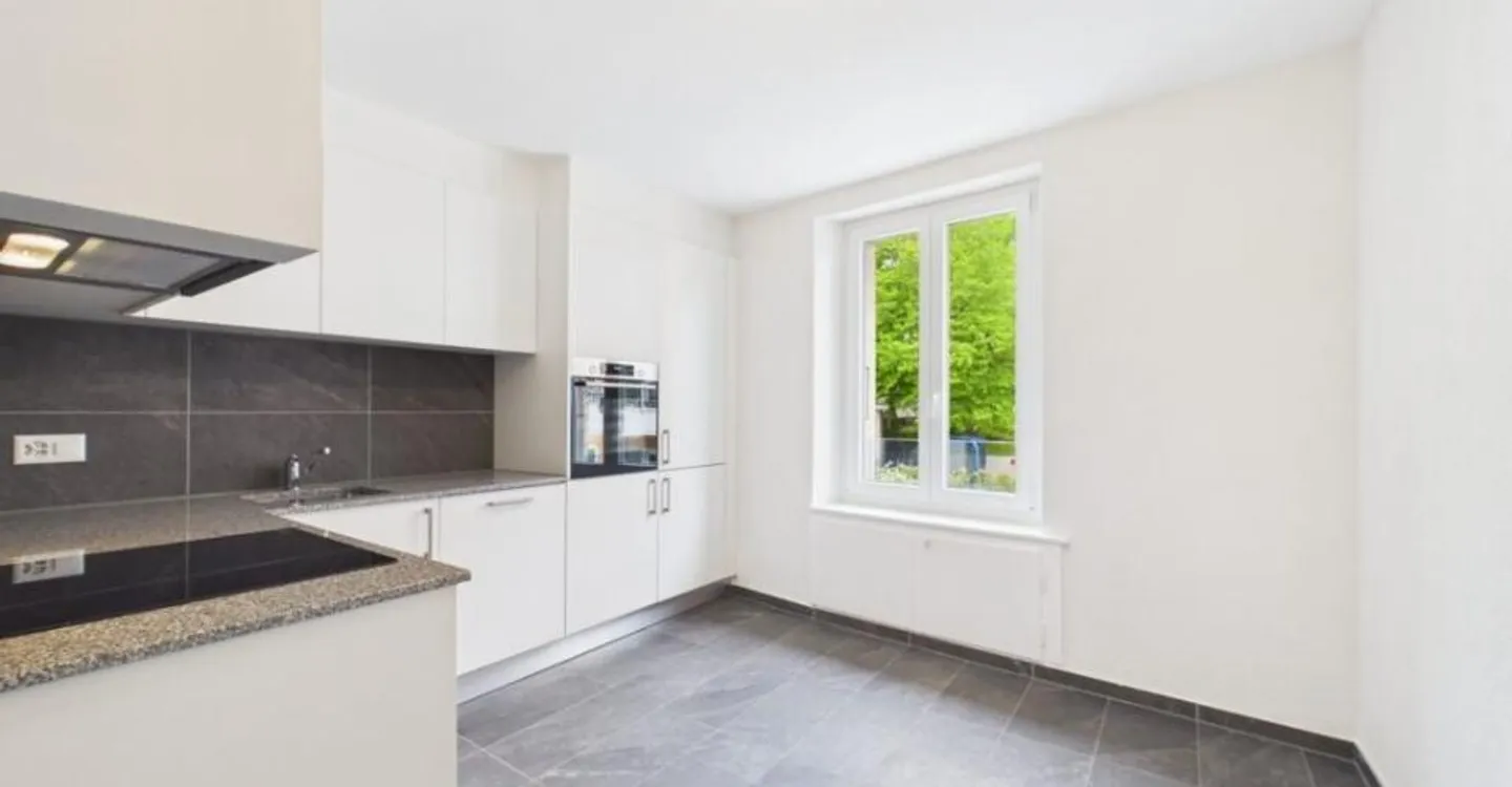 Bel Appartement Rénové - Photo 6 sur 10