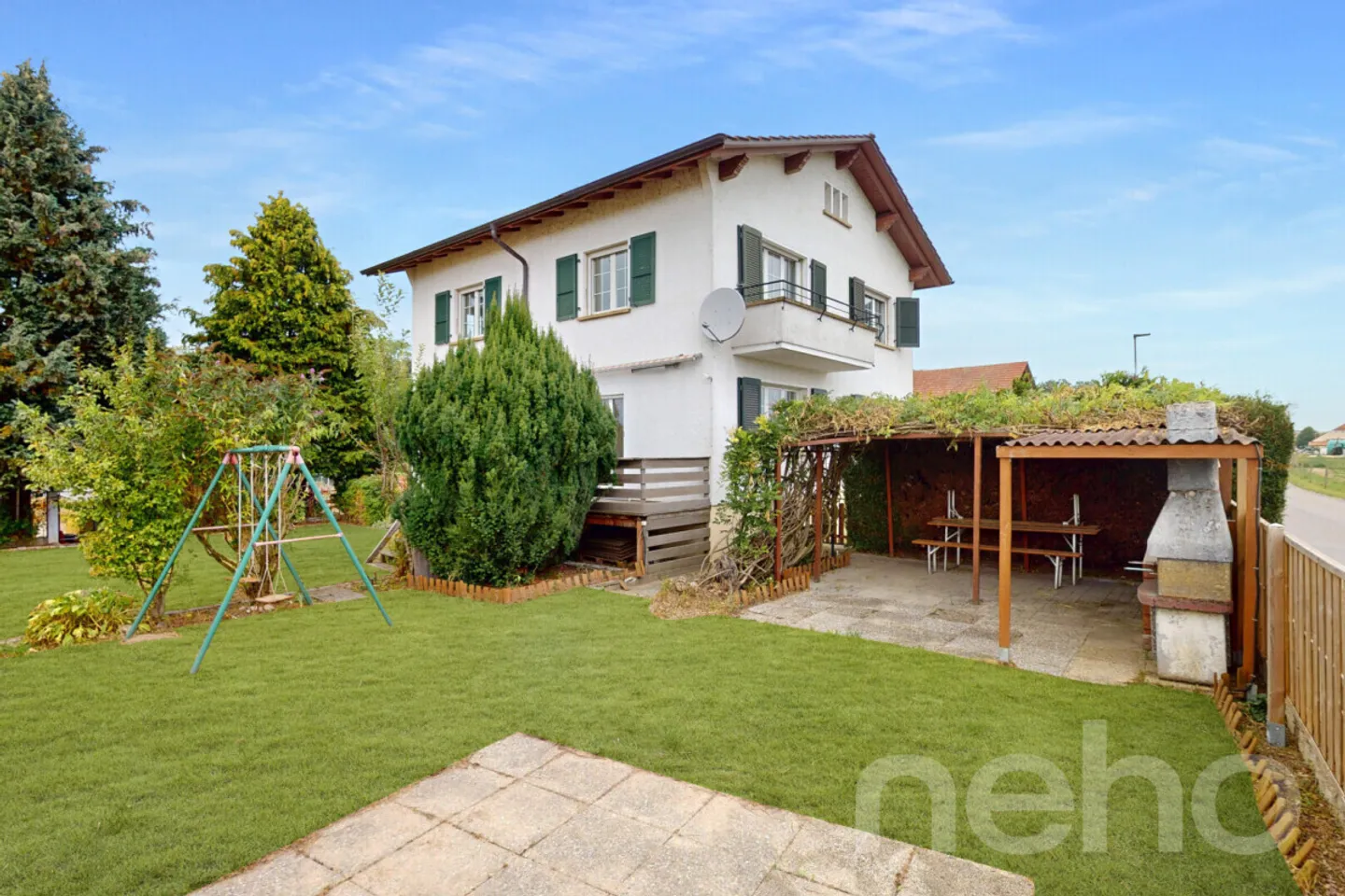 Bella casa bifamiliare con garage integrato e giardino soleggiato! - Foto 2 di 13