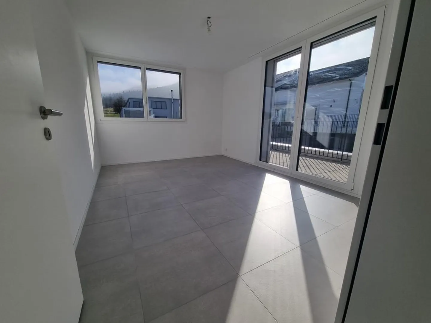 Geräumige Wohnung mit Sitzplatz - Foto 5 von 5