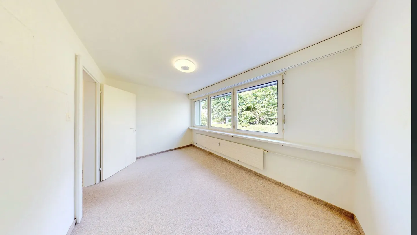 Vivre sur deux niveaux ! Charmante maisonette de 3,5 pièces avec vue sur la verdure - Photo 9 sur 16