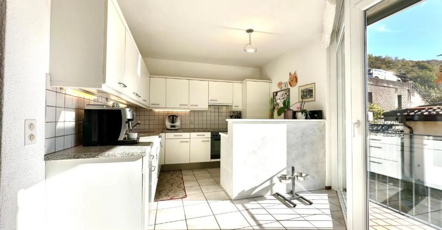 Charmante maison individuelle de 4,5 pièces avec terrain constructible. - Photo 3 of 10