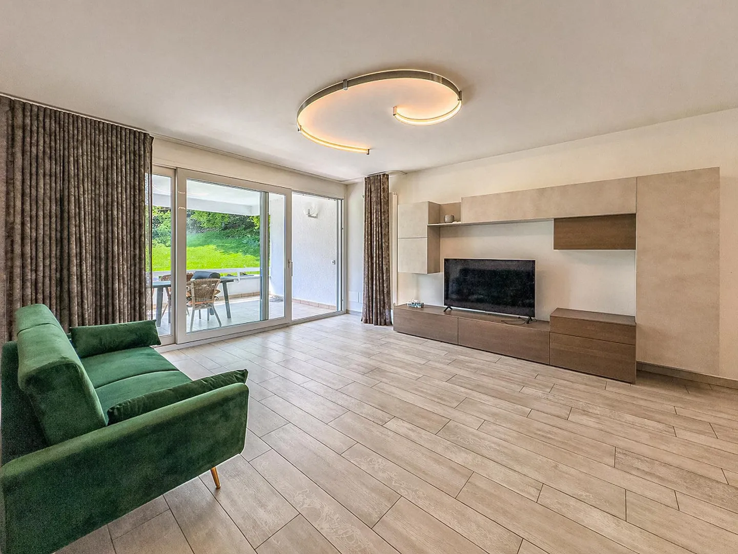 Appartement spacieux avec un aperçu du lac à Carona - Photo 2 sur 13