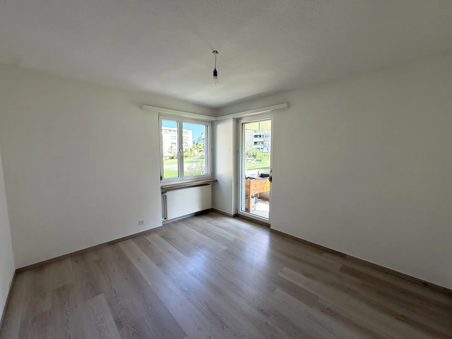 Cozy 3.5-room ground floor apartment with two balconies in a central location - Photo 9 of 13