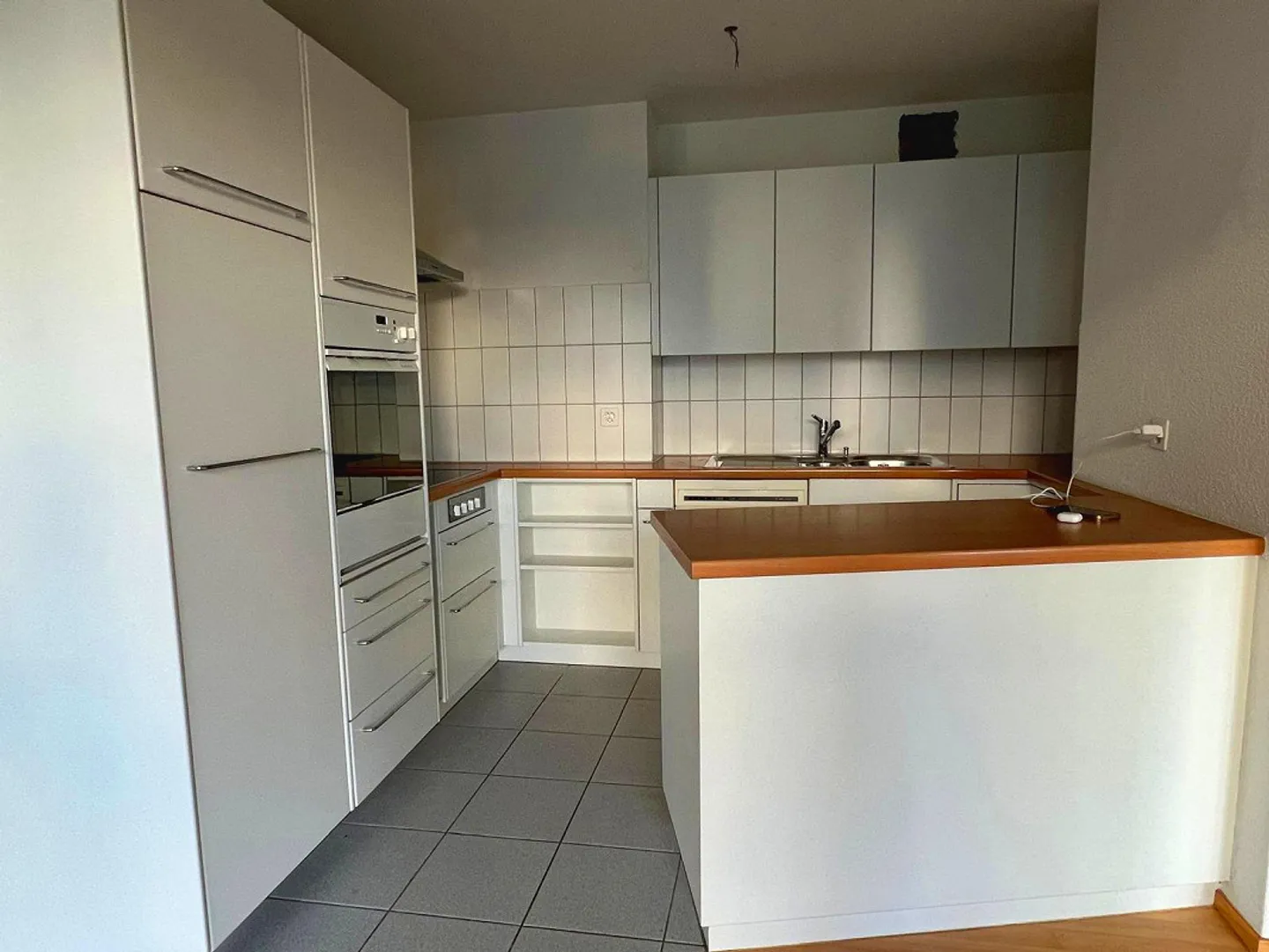 Appartamento 2.5 stanze con lavanderia privata e balcone in posizione centrale - Foto 5 di 10