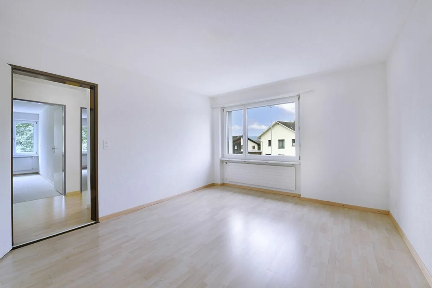 Appartement en copropriété de 4,5 pièces avec salle de loisirs et place de parking - Photo 4 sur 12