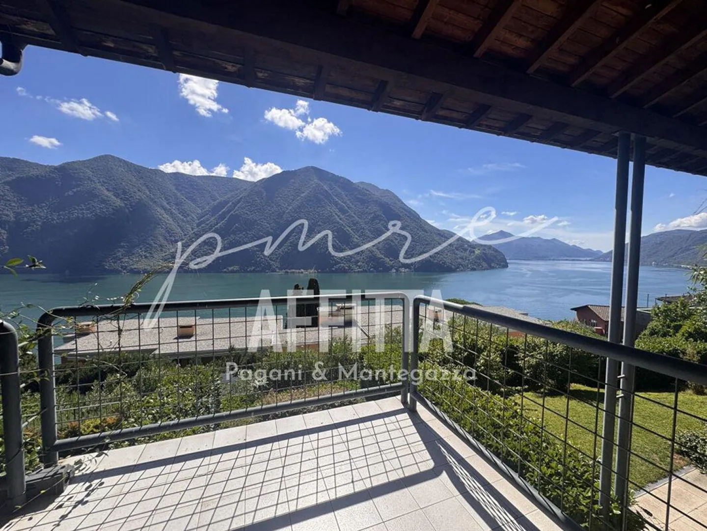 CASTAGNOLA | FOR RENT TOWNHOUSE WITH GARDEN AND LAKE VIEW - Photo 10 of 11