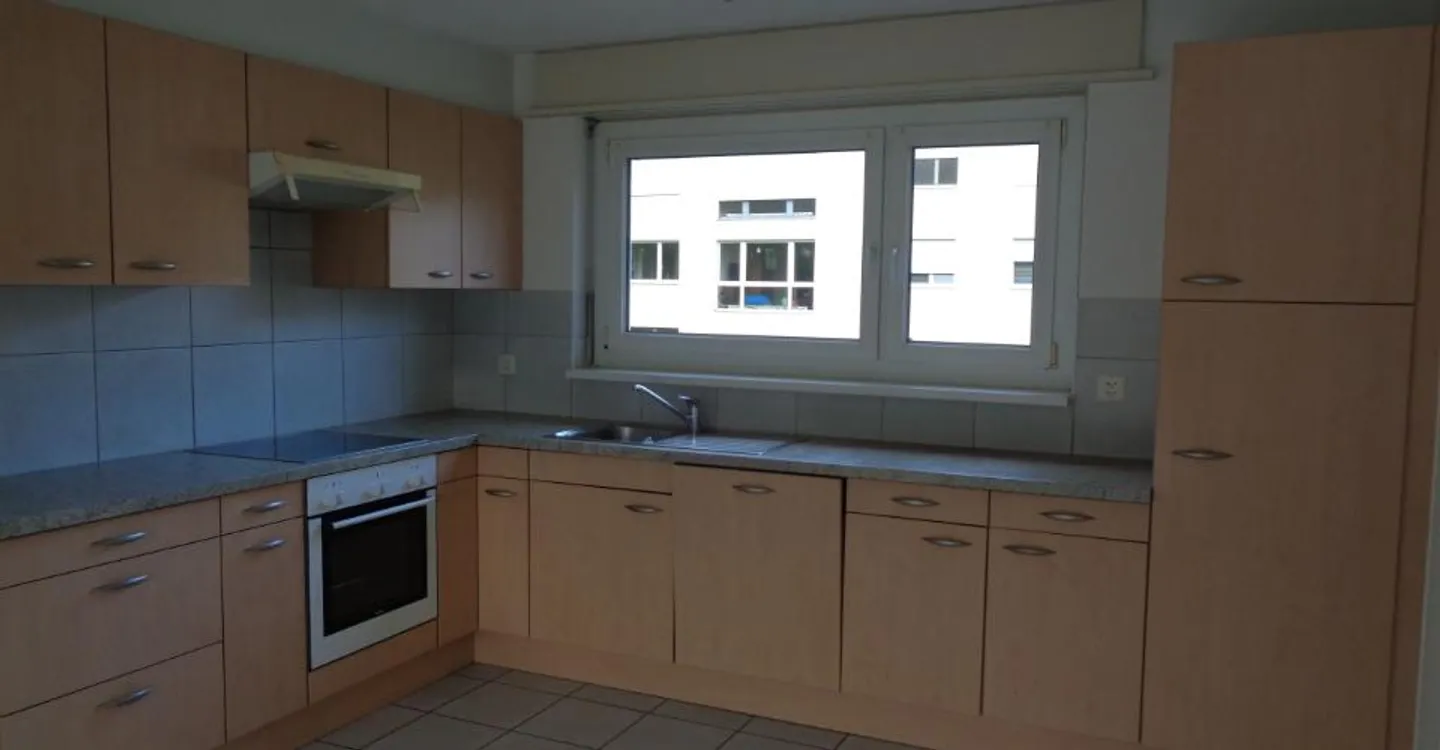 Appartement Charmant dans un Quartier Calme - Photo 2 sur 12