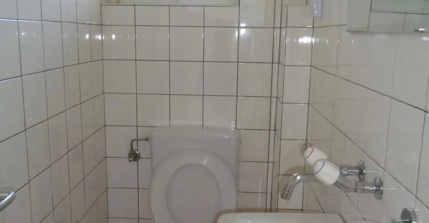 Appartement Charmant dans un Quartier Calme - Photo 5 sur 12
