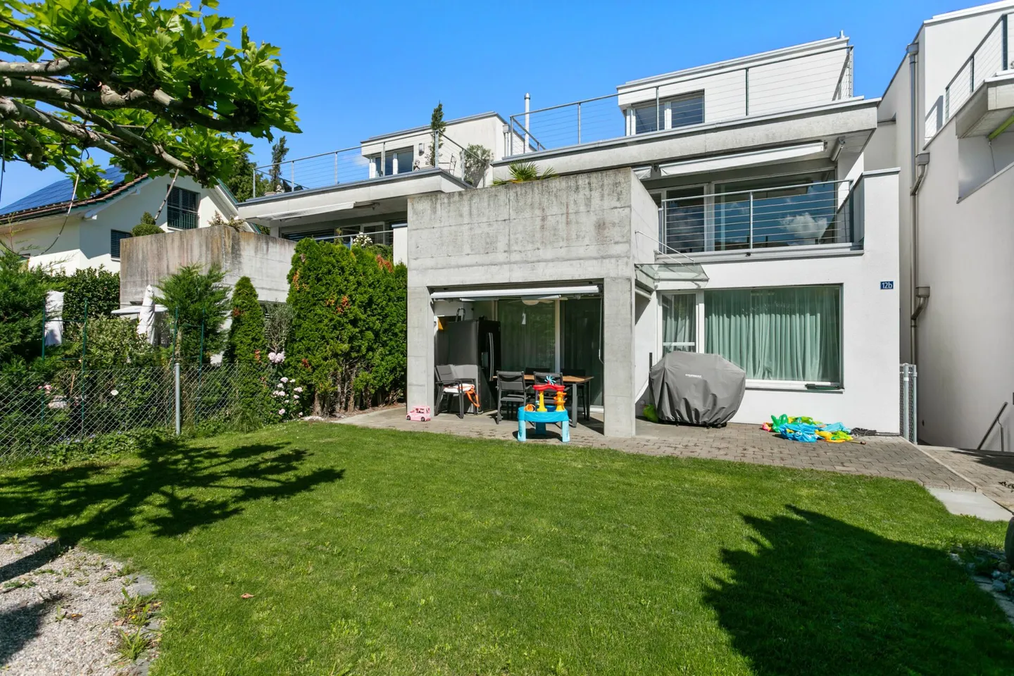 Modern Family Home with Lake View and Garden - Photo 1 of 31