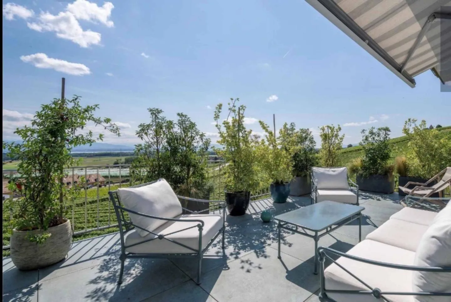 In the Heart of La Côte - Extraordinary Duplex with Lake View - Photo 2 of 12