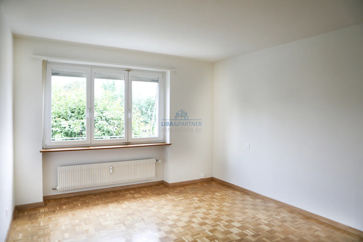 Spacious 3.5-room apartment with balcony and garden access - Photo 8 of 13