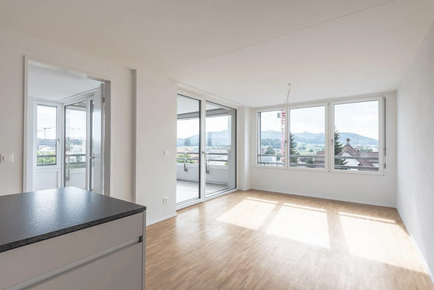 Moderne 3.5-Zimmer-Wohnung mit Balkon und Stadtblick in Zollikofen - Foto 3 von 10