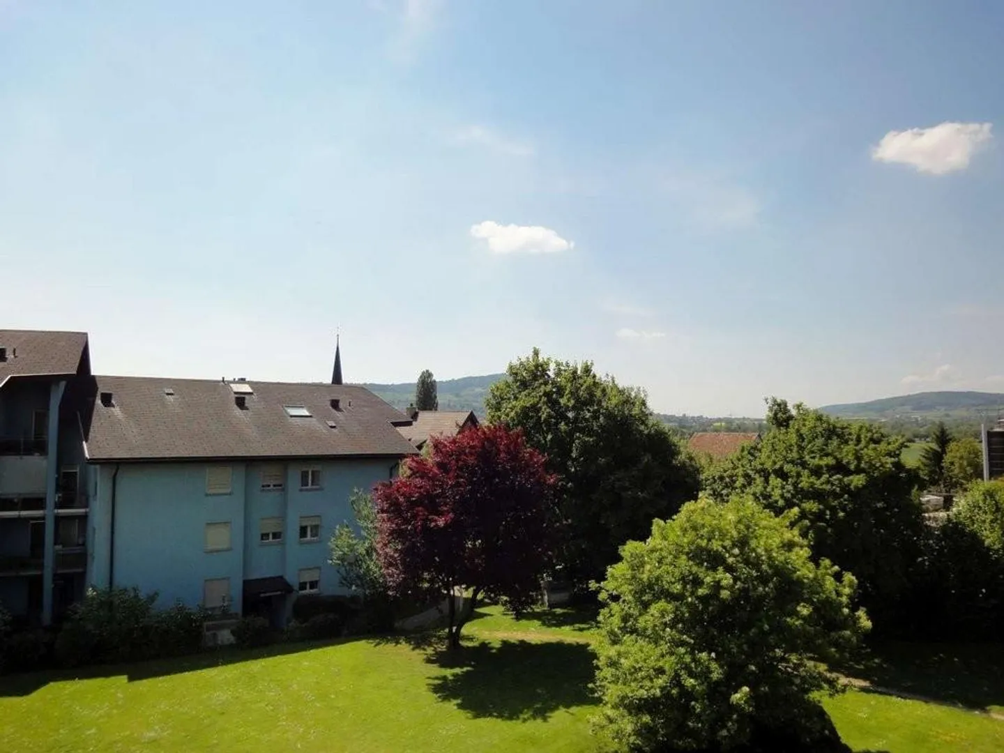 Living in the village center of Niederhasli - Photo 1 of 9