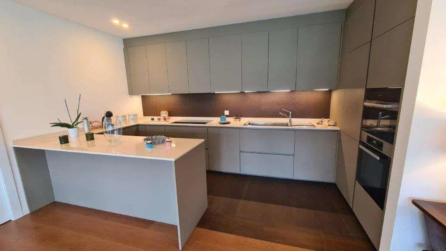 BISSONE : APPARTEMENT PRESTIGIEUX 4.5 PIÈCES AVEC VUE SUR LE LAC ET JARDIN - Photo 8 sur 13