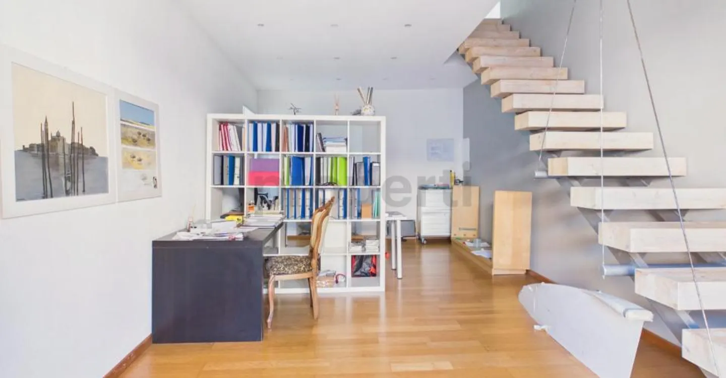 Renovated building in the heart of Contone: a charming duplex attic and two already rented apartments. - Photo 7 of 13