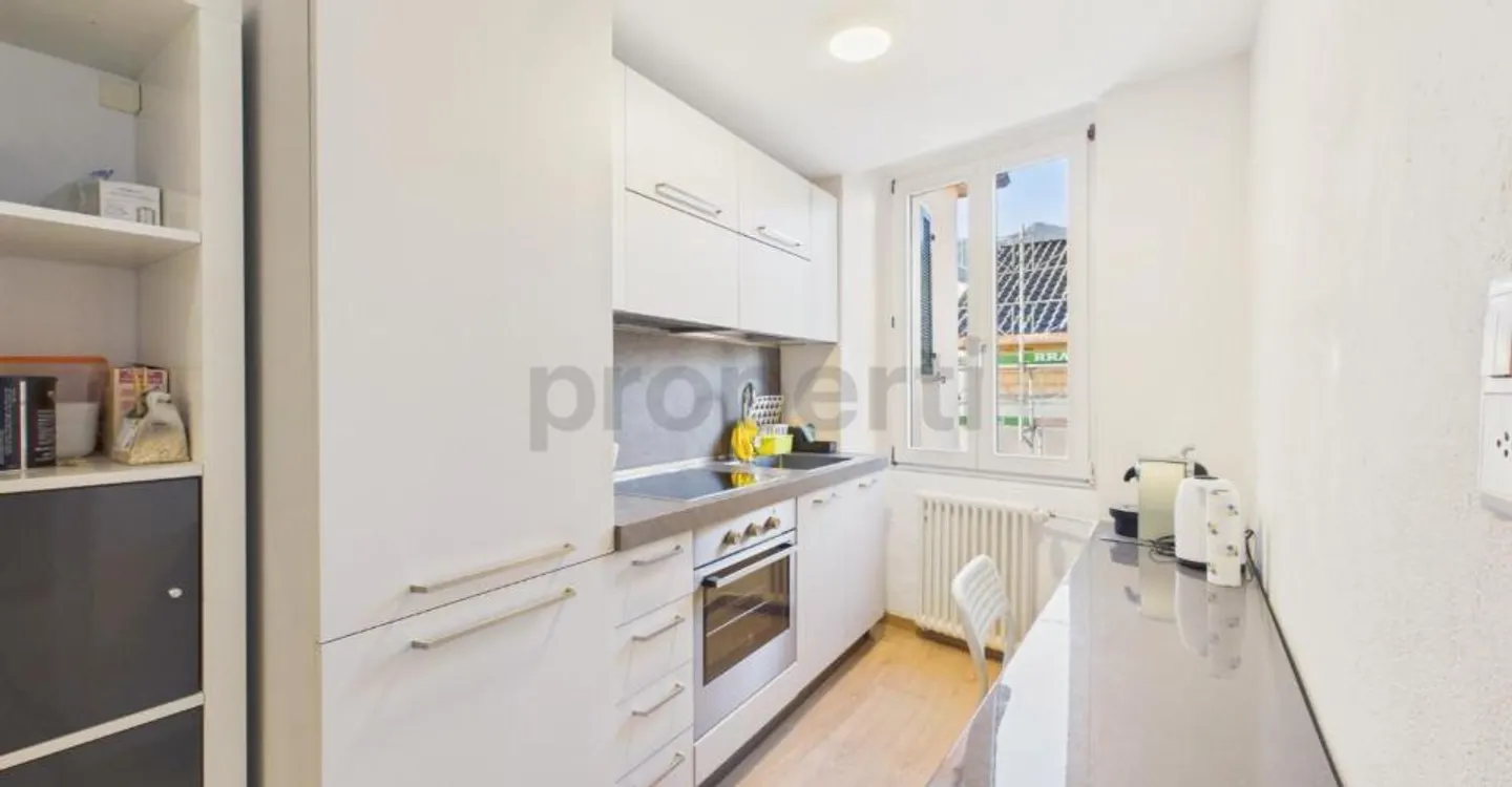Renovated building in the heart of Contone: a charming duplex attic and two already rented apartments. - Photo 9 of 13