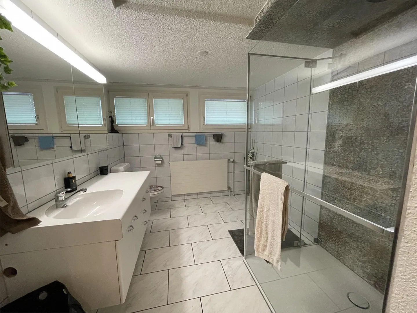 Maison trifamiliale dans un quartier résidentiel calme et familial - Photo 8 sur 16