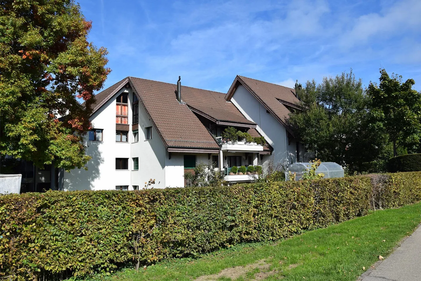 Appartement 4 pièces au 1er étage avec salle de bricolage et place de parking souterrain - Photo 2 sur 17