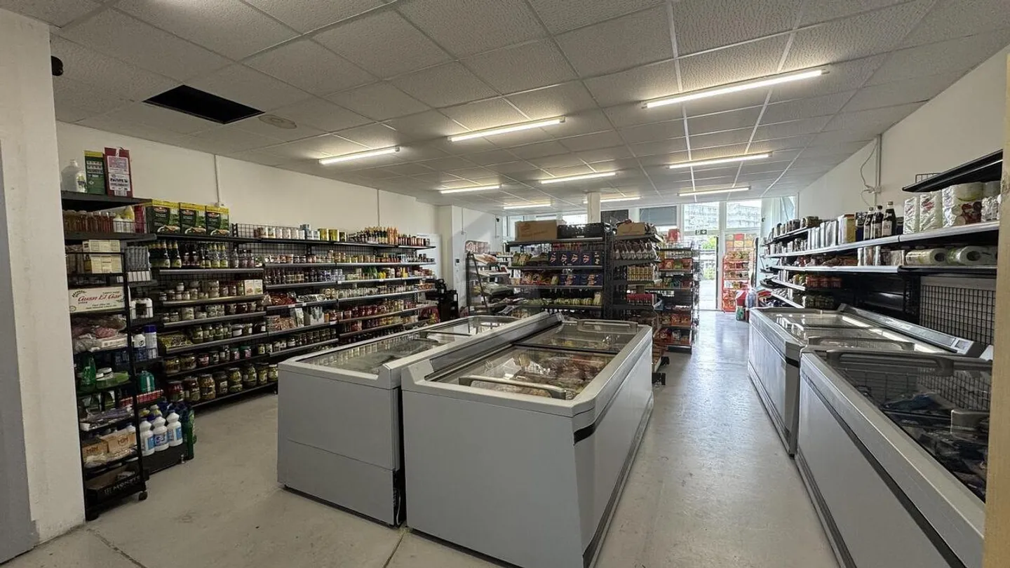 STORE IN A NEW NEIGHBORHOOD - Photo 2 of 5