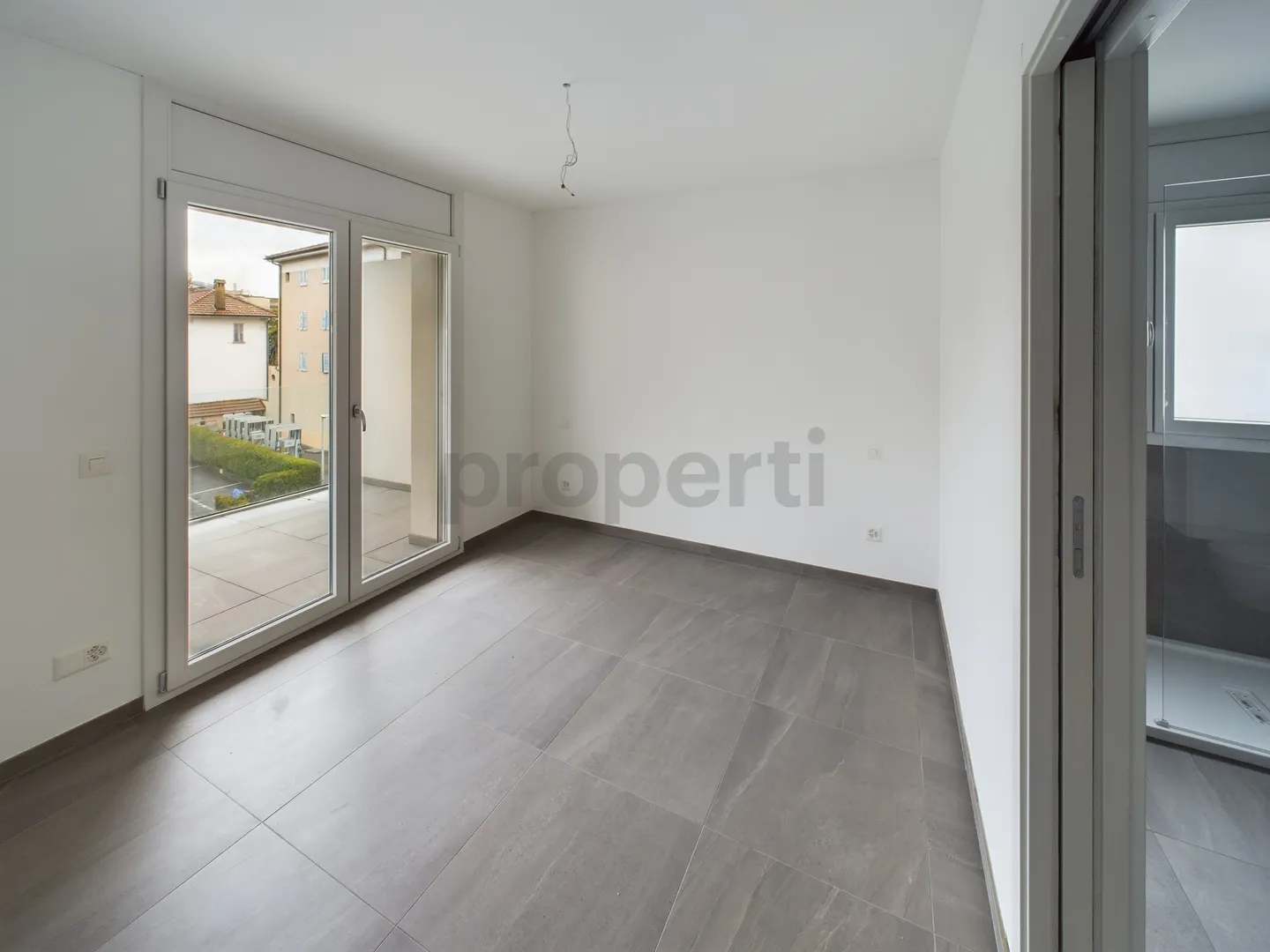 Modernes 3,5-Zimmer-Apartment in Caslano - Foto 5 von 11
