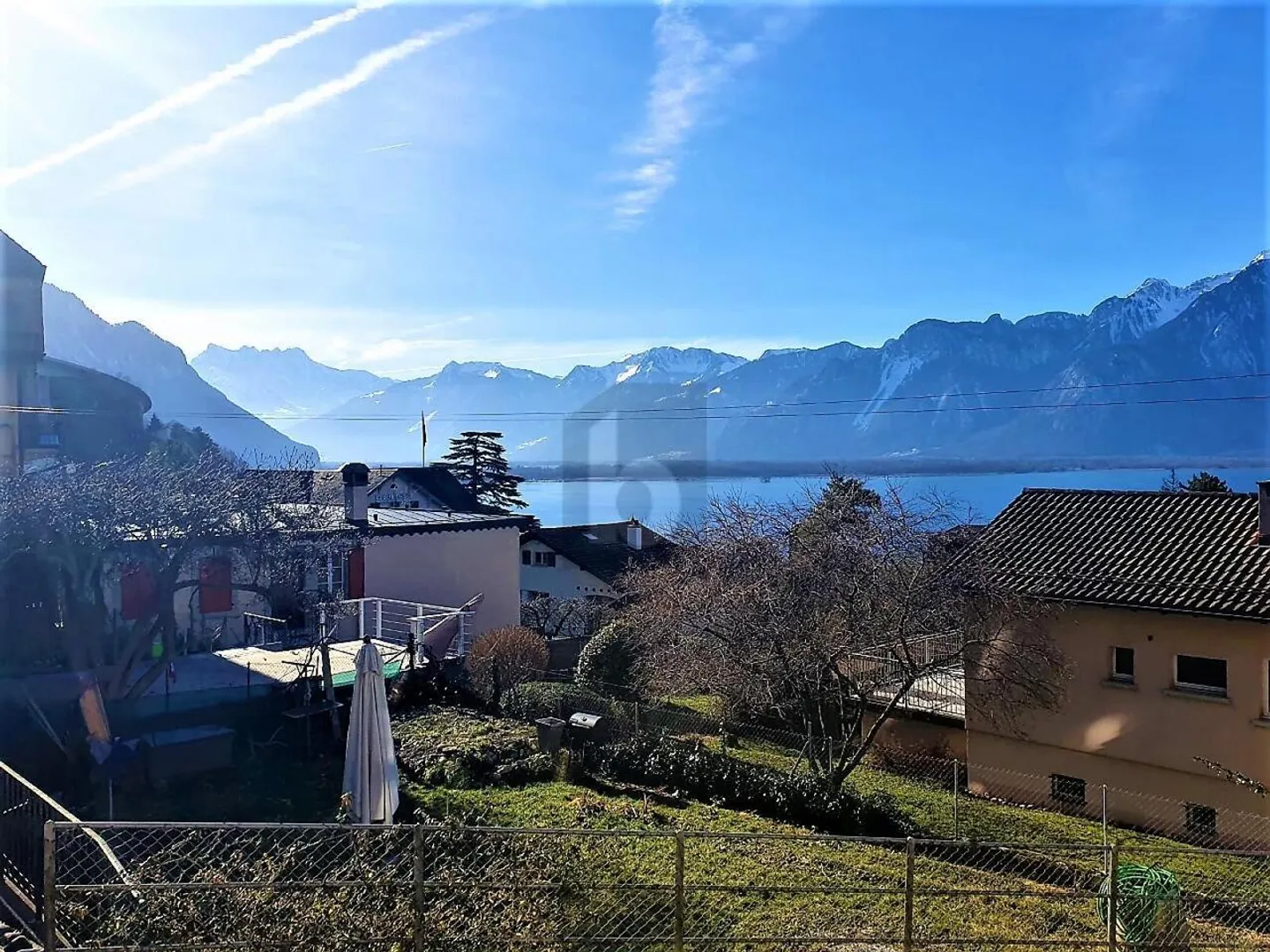 CALM, WITH A VIEW OF THE LAKE - Photo 1 of 6