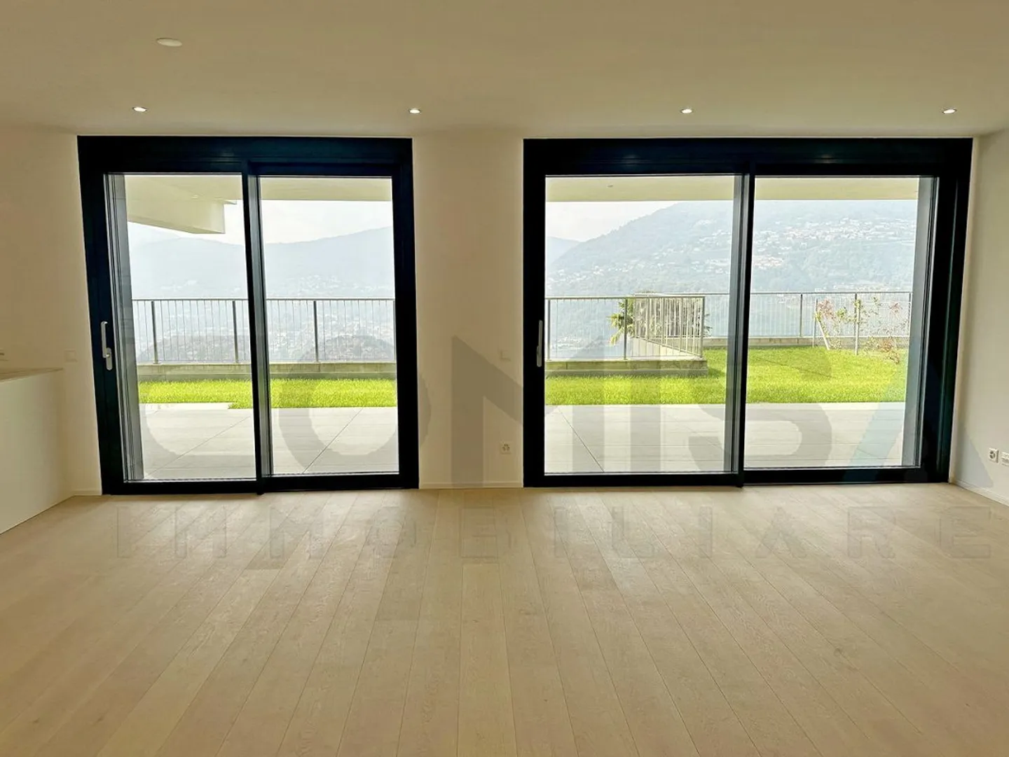 MONTAGNOLA - ARASIO nouveau 4.5 pièces avec jardin et vue sur le lac - Photo 4 sur 10