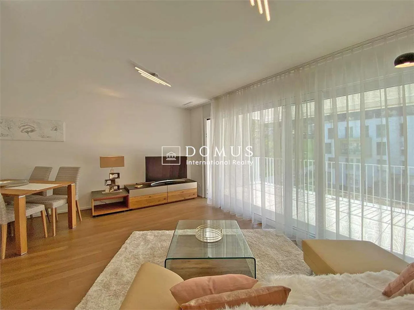 Élégant 2,5 pièces avec terrasse et bien-être - Photo 2 sur 13