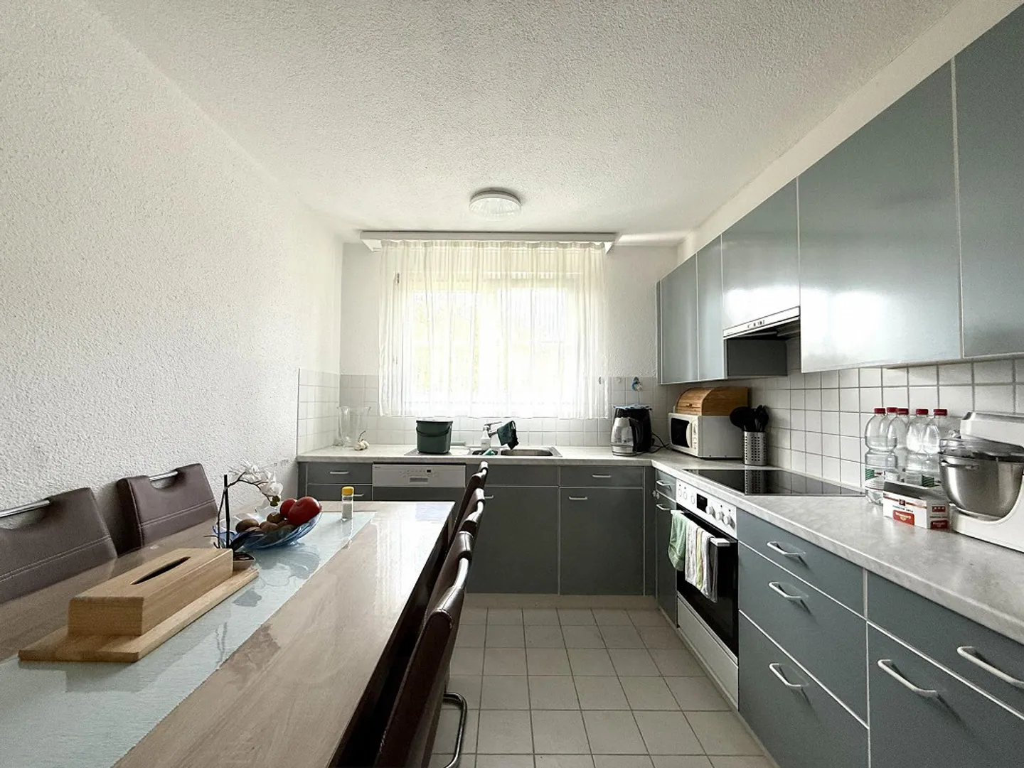 Cozy 4.5-room apartment with balcony in a quiet location in Nürensdorf - Photo 4 of 11