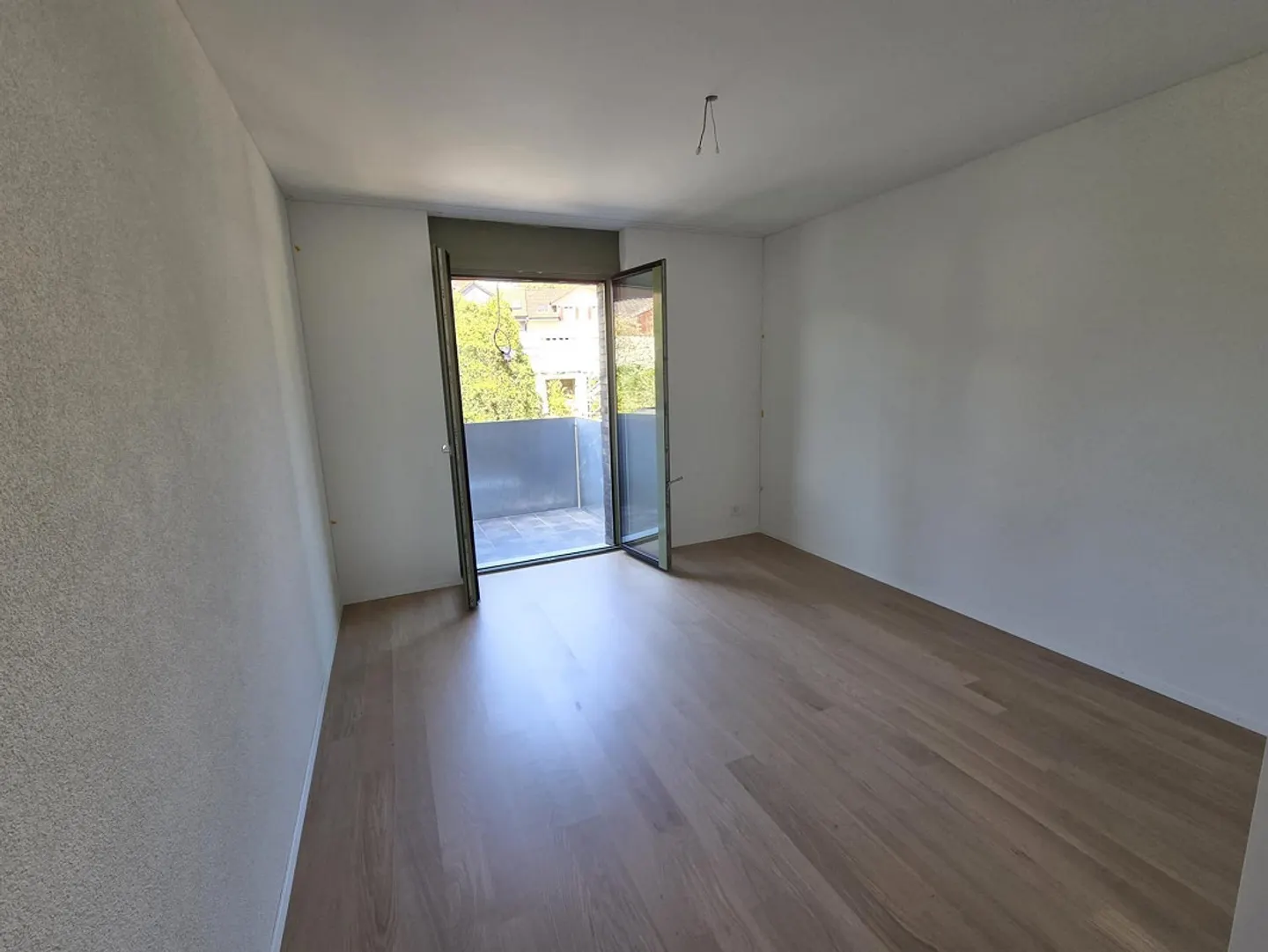 Vivere lungo il fiume: Appartamento nuovo di 2,5 stanze con grande balcone - Foto 4 di 5