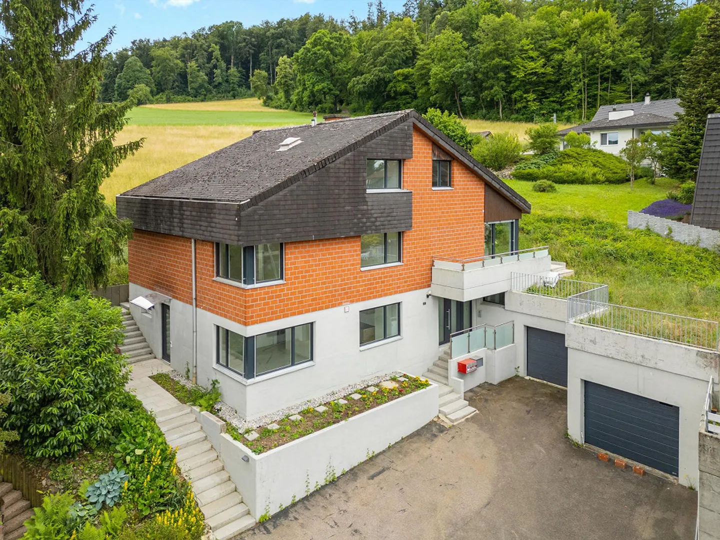 Modern Single-Family Home with Apartment - Photo 1 of 20