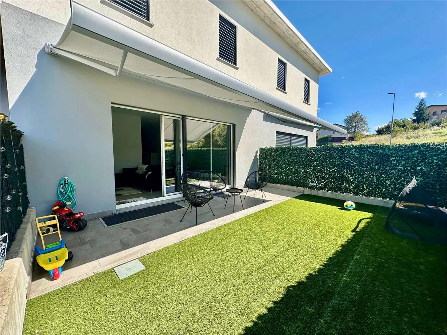 Modern row house villa with private garden in Arzo, Minergie standard - Photo 1 of 11