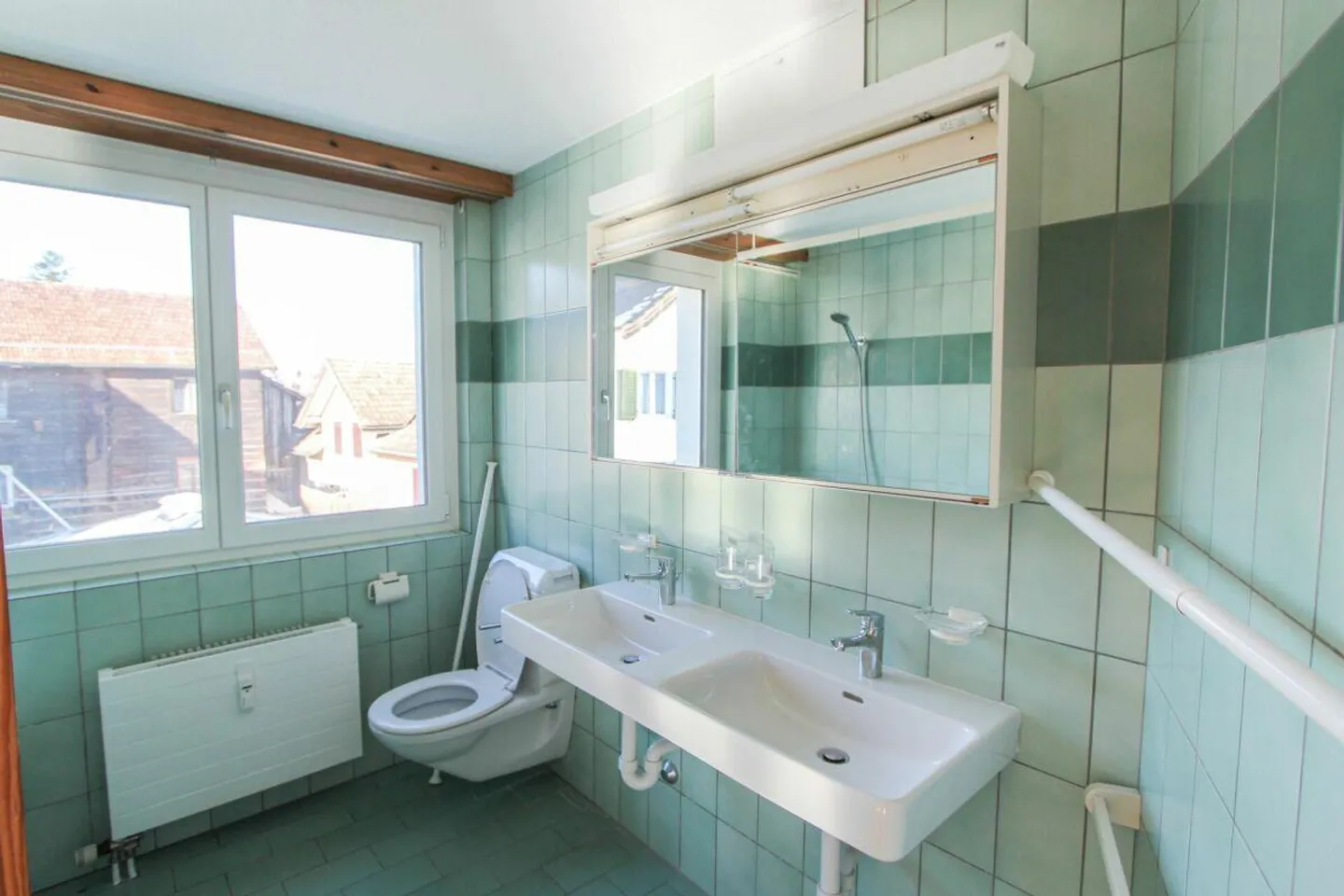 Appartement spacieux de 3,5 pièces au centre du village - Photo 10 sur 11