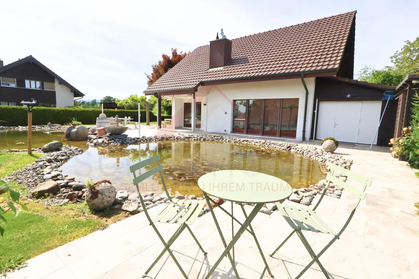 Paradiso familiare con giardino da sogno e stagno naturale a Hagneck - Foto 5 di 30
