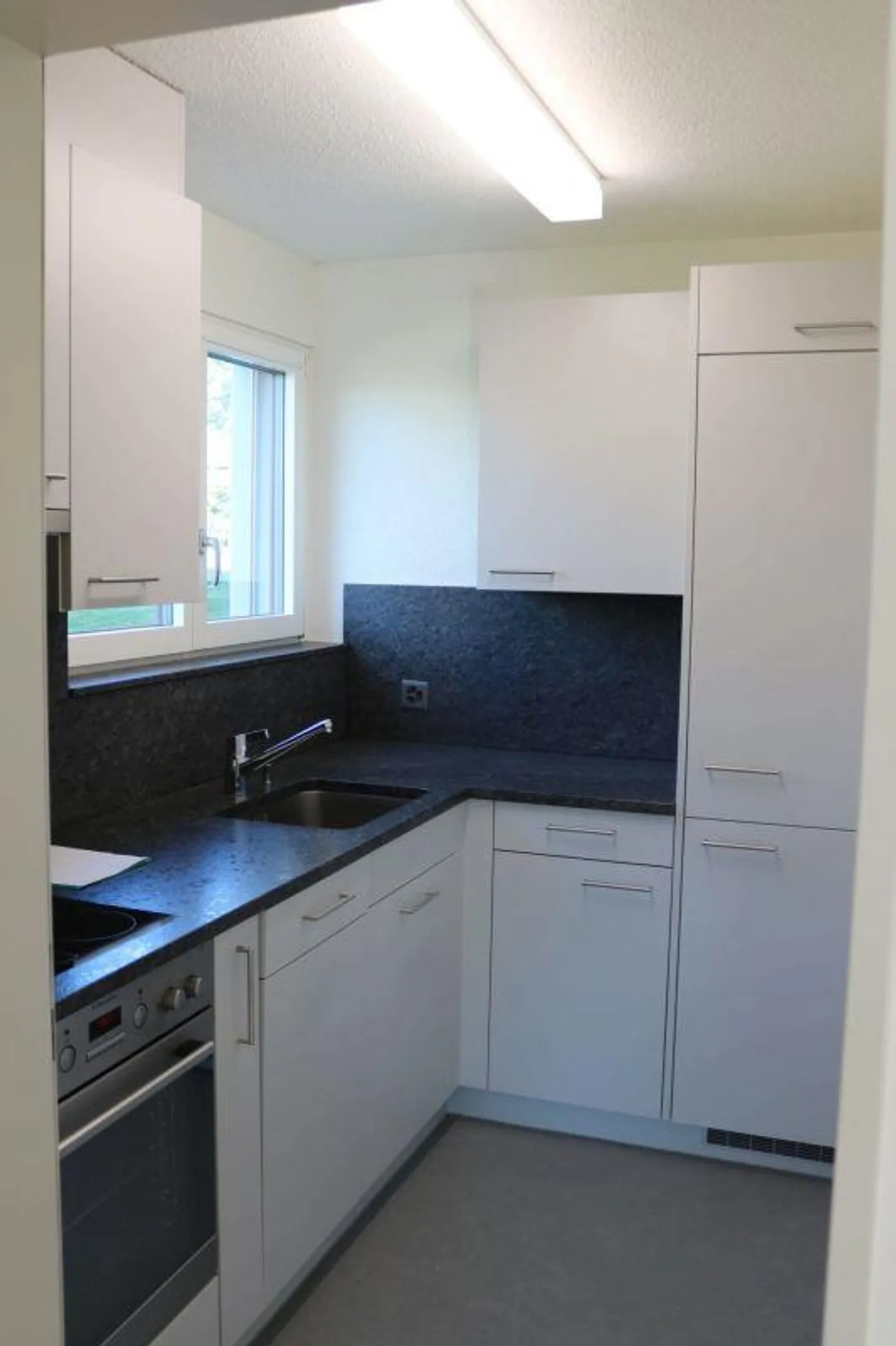 Helle Single-Wohnung mit Sitzplatz - Foto 1 von 9