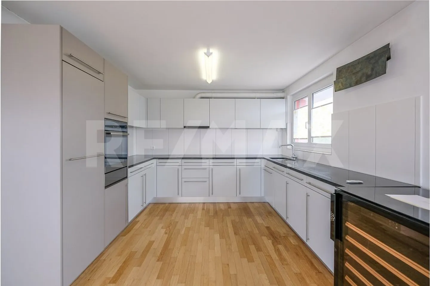 Appartement en duplex unique et exceptionnel de 4,5 pièces dans un ancien bâtiment d'imprimerie - Photo 6 sur 13