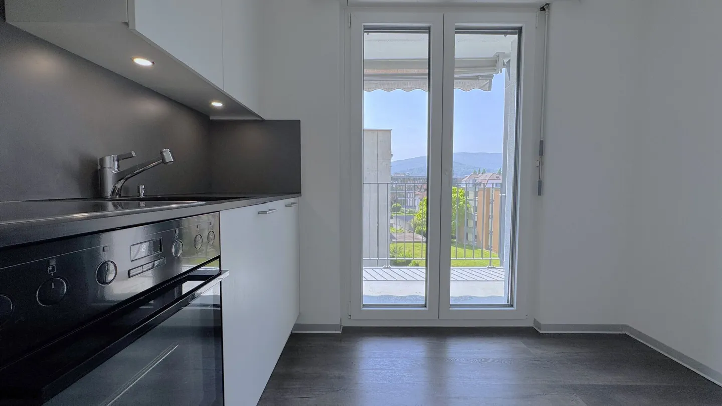 Renovierte 4,5-Zimmer-Wohnung mit herrlichem Blick und einem sehr schönen Garten - Foto 10 von 15