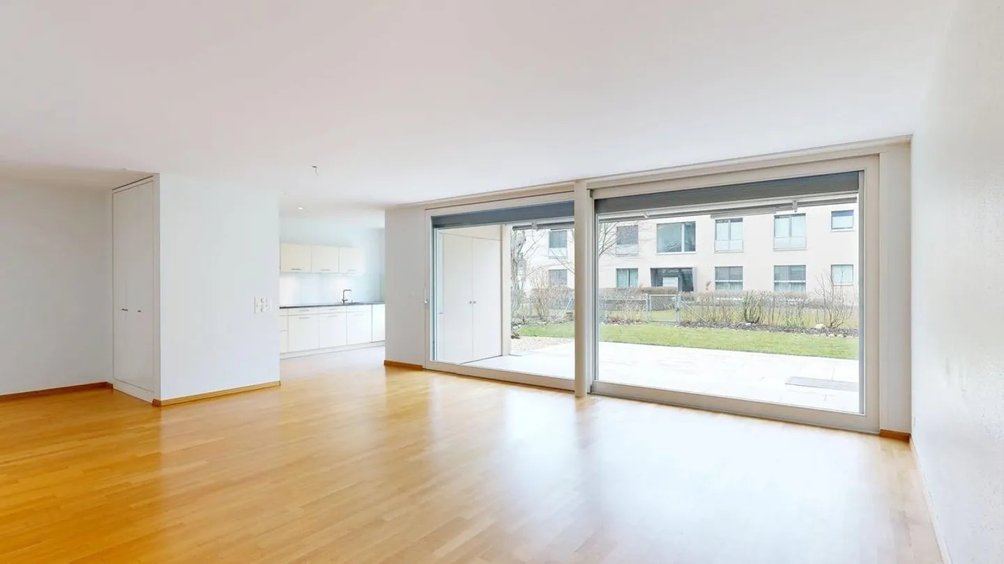 Bright 5.5-Room Garden Apartment with Plenty of Space to Live - Photo 1 of 12