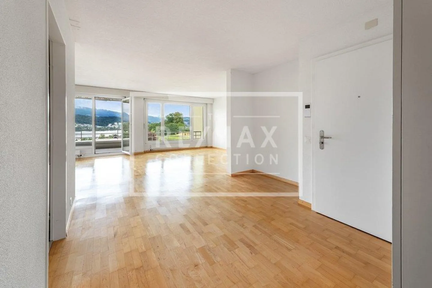 Geräumige Wohnung mit Seeblick - Foto 2 von 13